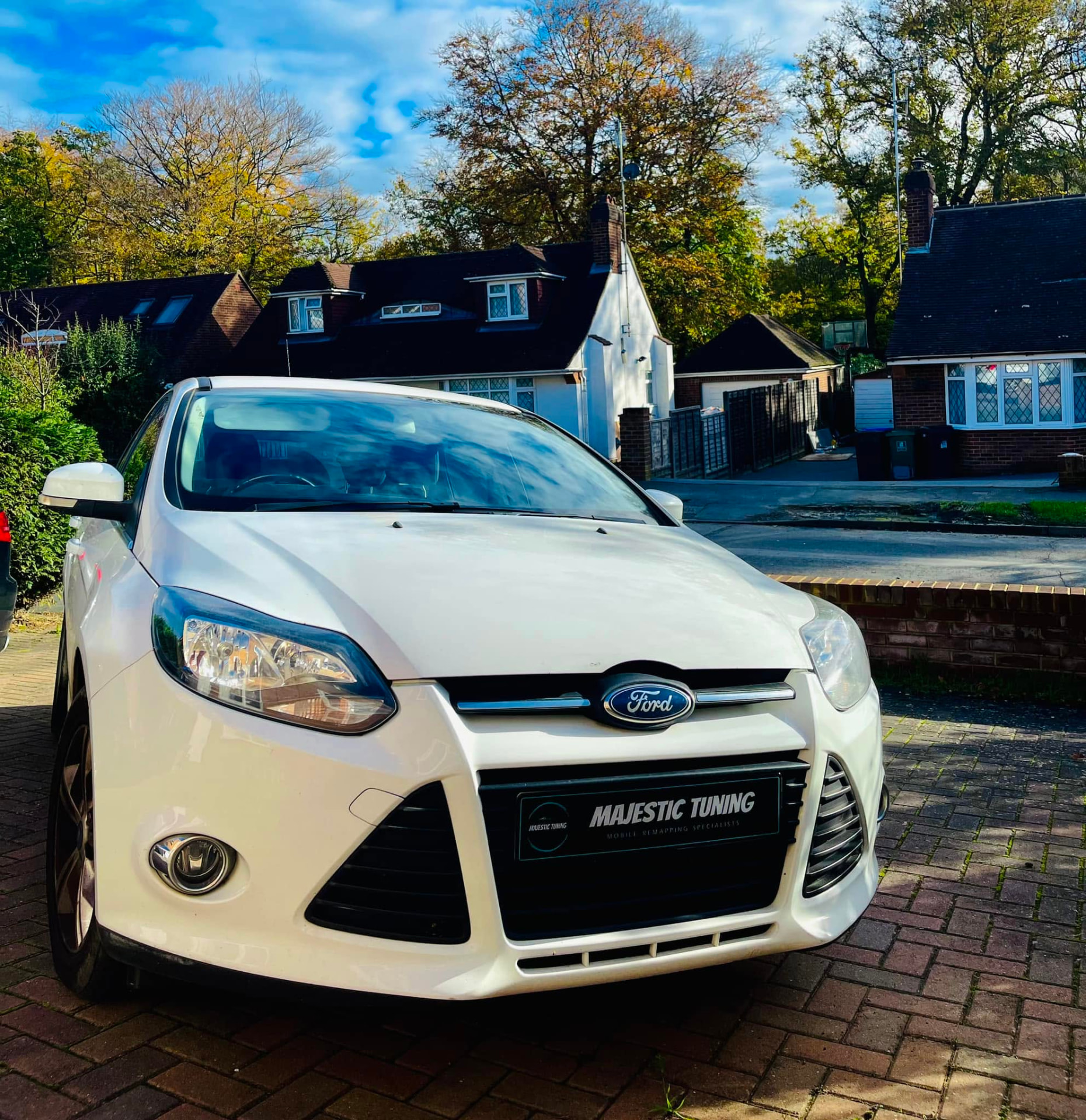 White Ford Focus with a Majestic Tuning plate