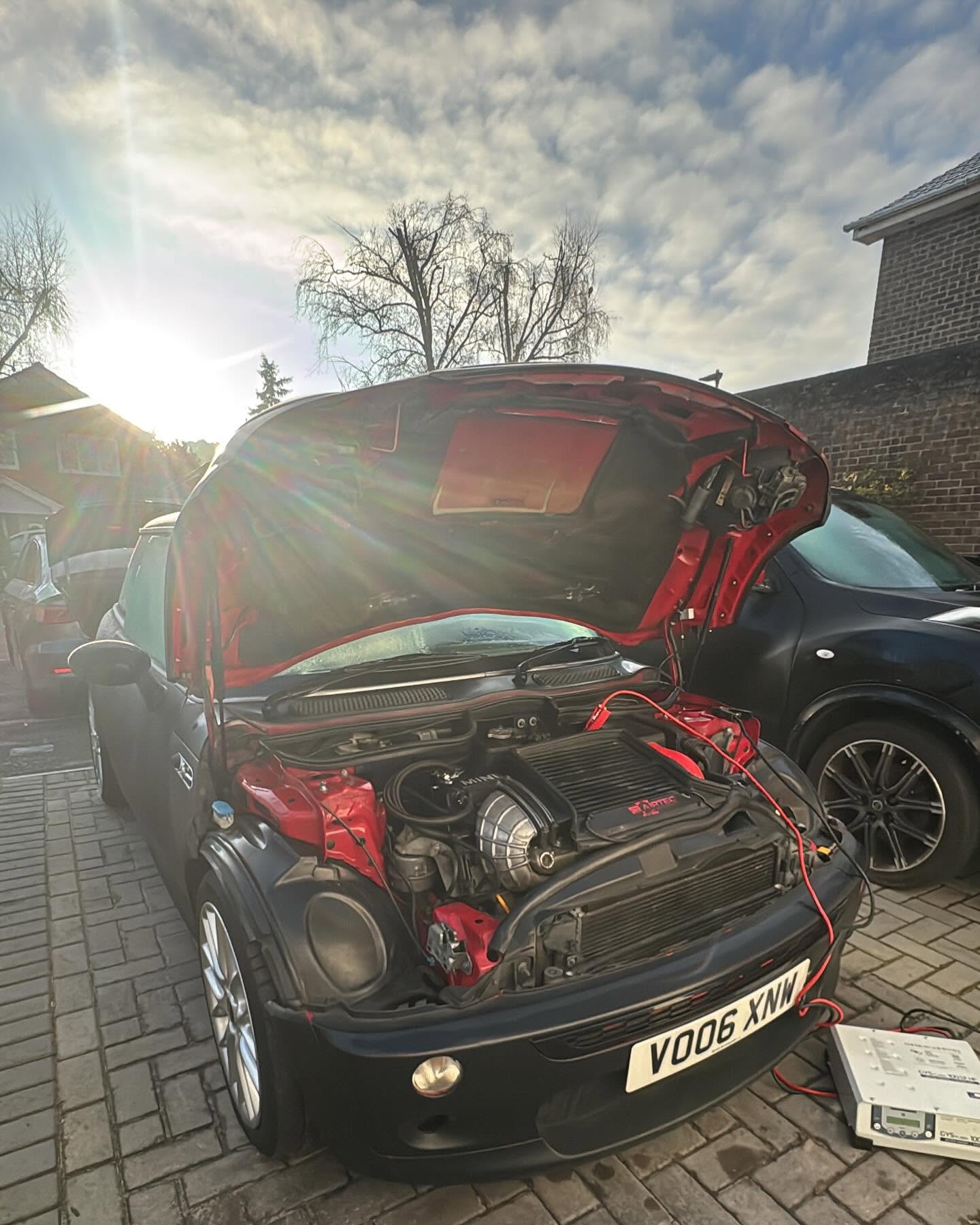 Mini Cooper S being programmed on a driveway